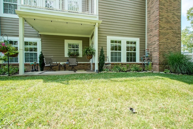 9743 Herons Cv, Carmel, IN 46280 - entrance to property featuring a balcony and a yard