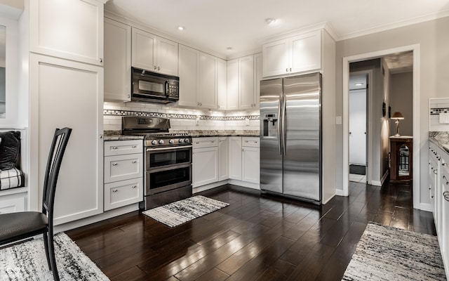 2949 River Bay Dr N, Indianapolis, IN 46240 - kitchen featuring stainless steel appliances, tasteful backsplash, stone counters, white cabinets, and recessed lighting
