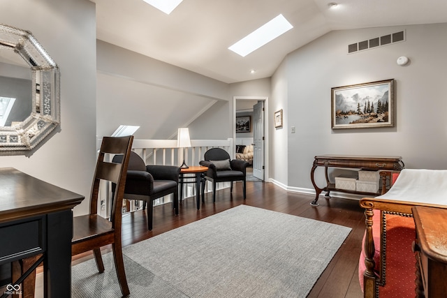 2949 River Bay Dr N, Indianapolis, IN 46240 - living area with a skylight, lofted ceiling, and dark wood-style floors