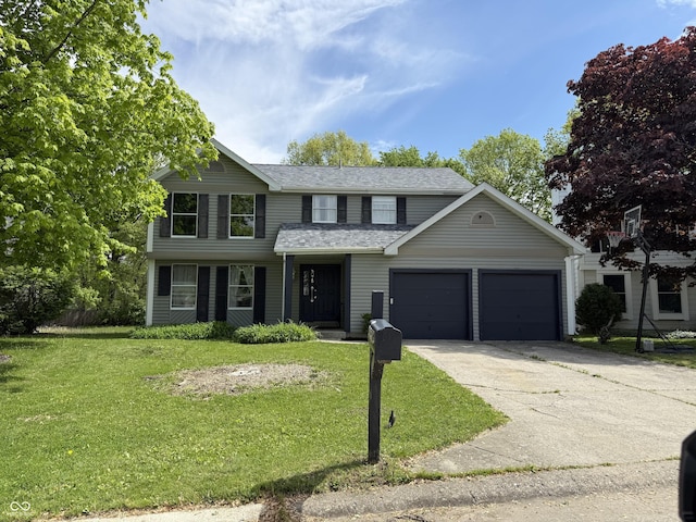 8075 Cardinal Cv E, Indianapolis, IN 46256 - traditional home featuring an attached garage, concrete driveway, a front lawn, and roof with shingles