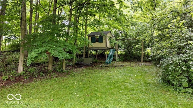 11956 Glen Cove Dr, Indianapolis, IN 46236 - view of green lawn featuring an outbuilding