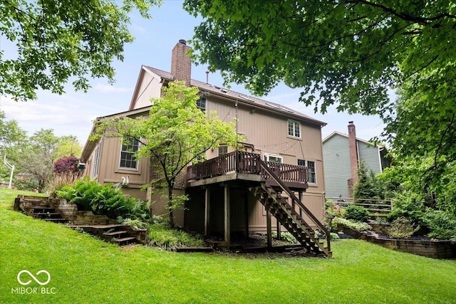 11956 Glen Cove Dr, Indianapolis, IN 46236 - back of house featuring stairs, a wooden deck, a lawn, and a chimney