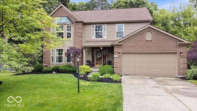 11956 Glen Cove Dr, Indianapolis, IN 46236 - view of front of home featuring driveway, a front yard, a garage, brick siding, and a shingled roof
