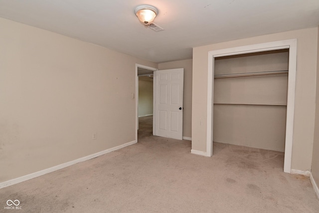 3668 Chatsbee Ct, Indianapolis, IN 46224 - unfurnished bedroom with carpet, a closet, and baseboards
