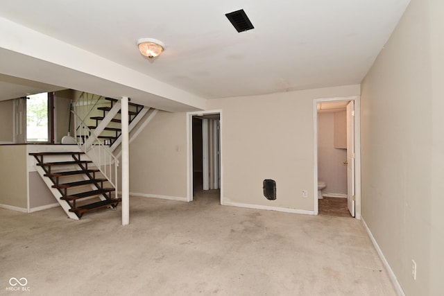 3668 Chatsbee Ct, Indianapolis, IN 46224 - basement with stairs, carpet, and baseboards