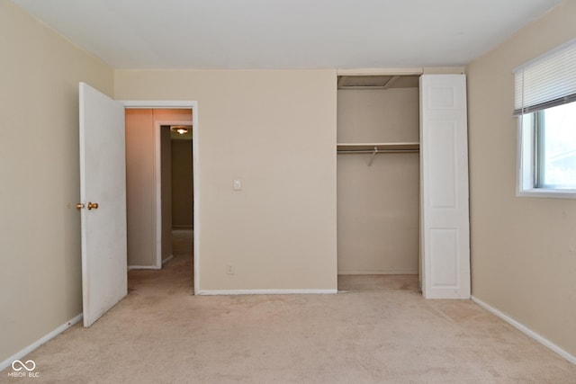 3668 Chatsbee Ct, Indianapolis, IN 46224 - unfurnished bedroom with carpet floors, baseboards, and a closet