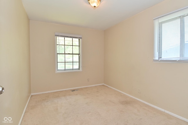 3668 Chatsbee Ct, Indianapolis, IN 46224 - spare room featuring carpet flooring and baseboards