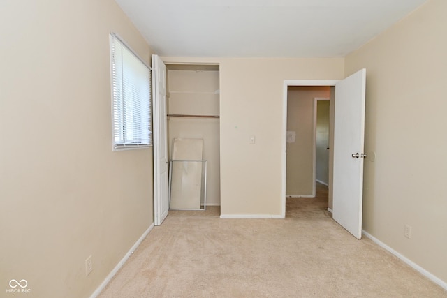 3668 Chatsbee Ct, Indianapolis, IN 46224 - unfurnished bedroom with light colored carpet and baseboards