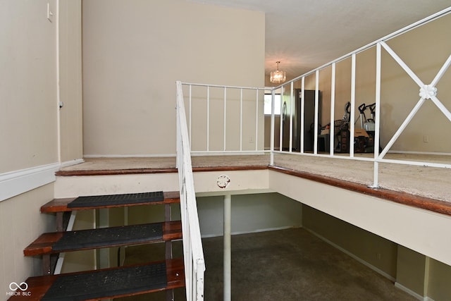 3668 Chatsbee Ct, Indianapolis, IN 46224 - stairway with a chandelier