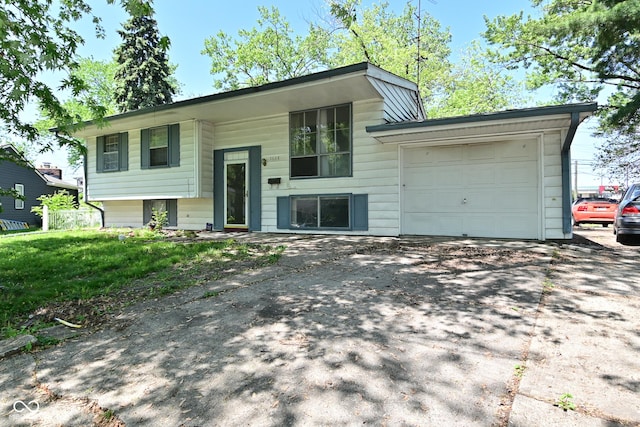 3668 Chatsbee Ct, Indianapolis, IN 46224 - bi-level home with an attached garage and driveway