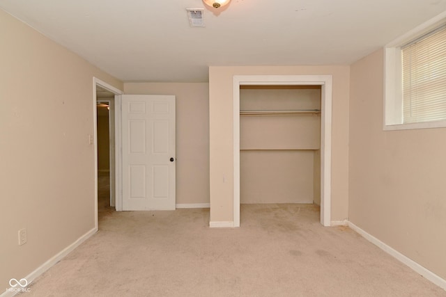 3668 Chatsbee Ct, Indianapolis, IN 46224 - unfurnished bedroom featuring carpet flooring, a closet, and baseboards