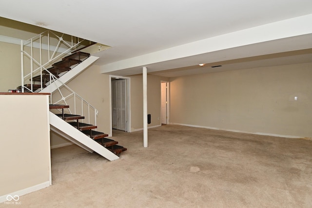 3668 Chatsbee Ct, Indianapolis, IN 46224 - finished below grade area with stairs, carpet flooring, and baseboards