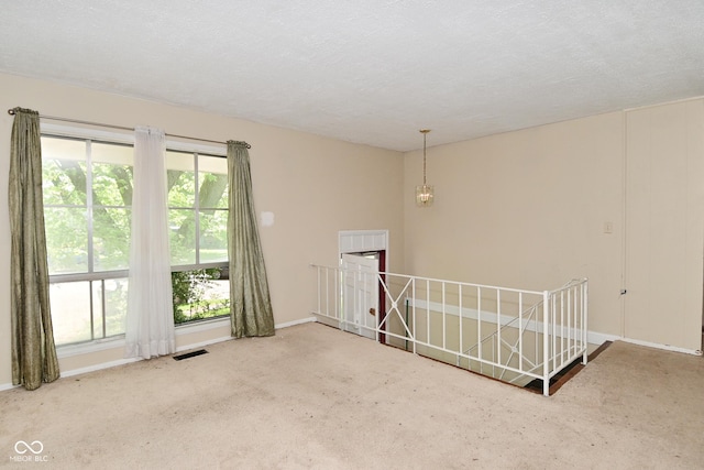 3668 Chatsbee Ct, Indianapolis, IN 46224 - spare room featuring baseboards and carpet flooring