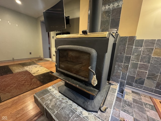 16952 Bookout Rd, Hagerstown, IN 47346 - detailed view of a wood stove and baseboards
