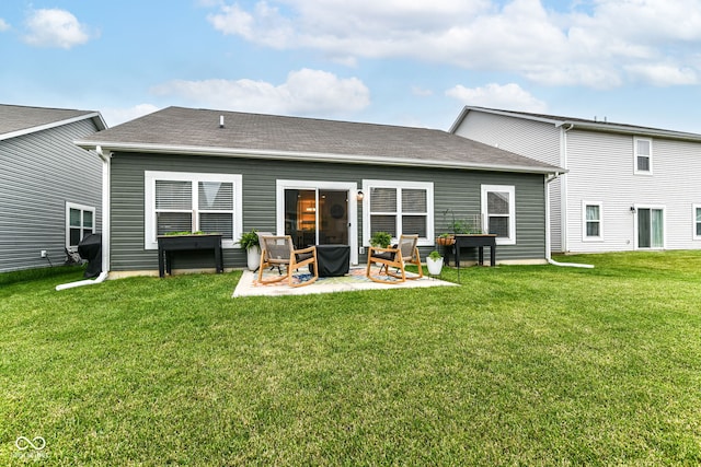 6556 Sulgrove Pl, Indianapolis, IN 46221 - rear view of property with a patio and a yard
