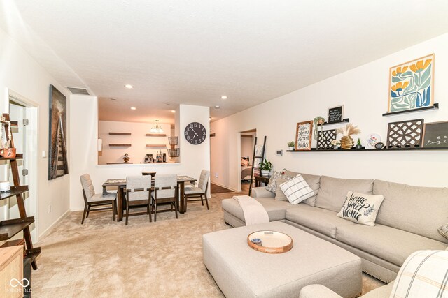 6556 Sulgrove Pl, Indianapolis, IN 46221 - living room featuring light colored carpet, recessed lighting, and baseboards