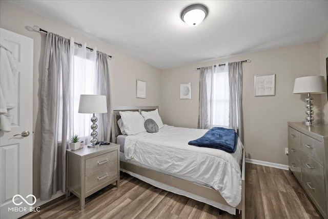 1907 N Drexel Ave, Indianapolis, IN 46218 - bedroom featuring wood finished floors and baseboards