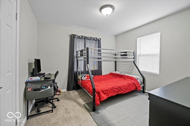 1907 N Drexel Ave, Indianapolis, IN 46218 - carpeted bedroom featuring an office area