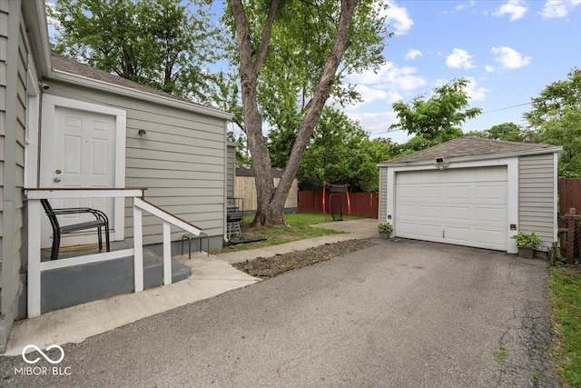 1907 N Drexel Ave, Indianapolis, IN 46218 - detached garage with asphalt driveway