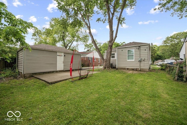 1907 N Drexel Ave, Indianapolis, IN 46218 - view of yard featuring a patio and an outdoor structure
