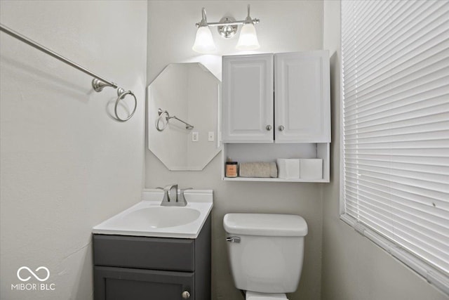 1907 N Drexel Ave, Indianapolis, IN 46218 - bathroom featuring vanity and toilet