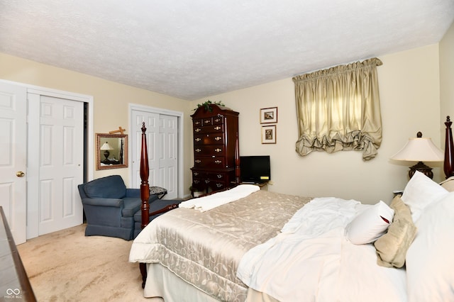 1102 Fox Hill Dr, Indianapolis, IN 46228 - bedroom featuring carpet floors and multiple closets