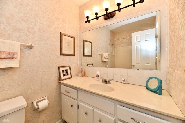 1102 Fox Hill Dr, Indianapolis, IN 46228 - bathroom with vanity, toilet, and a shower