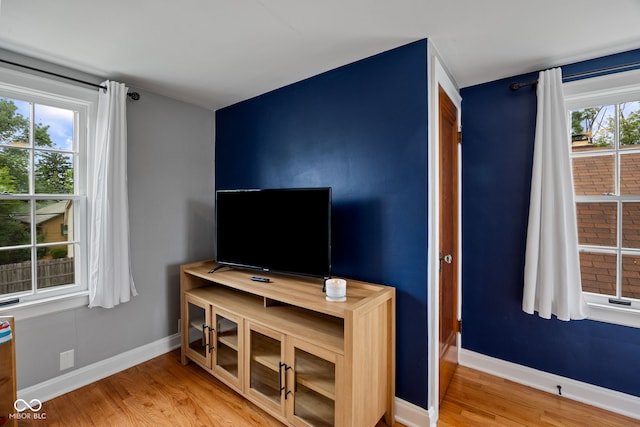1438 Adams St, Lafayette, IN 47905 - living room featuring wood finished floors and baseboards