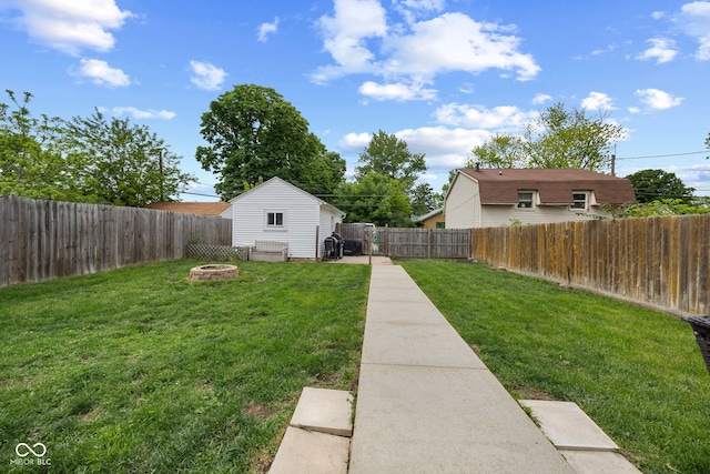 1438 Adams St, Lafayette, IN 47905 - view of yard featuring an outdoor fire pit
