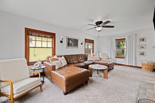 1438 Adams St, Lafayette, IN 47905 - living area featuring light carpet, a ceiling fan, crown molding, and baseboards