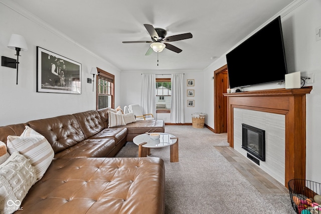 1438 Adams St, Lafayette, IN 47905 - living room featuring ceiling fan, light carpet, crown molding, a fireplace, and baseboards