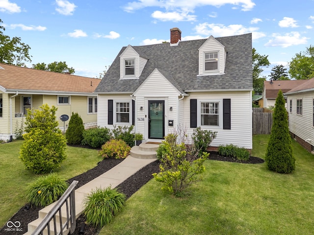 1438 Adams St, Lafayette, IN 47905 - cape cod house featuring a chimney and roof with shingles