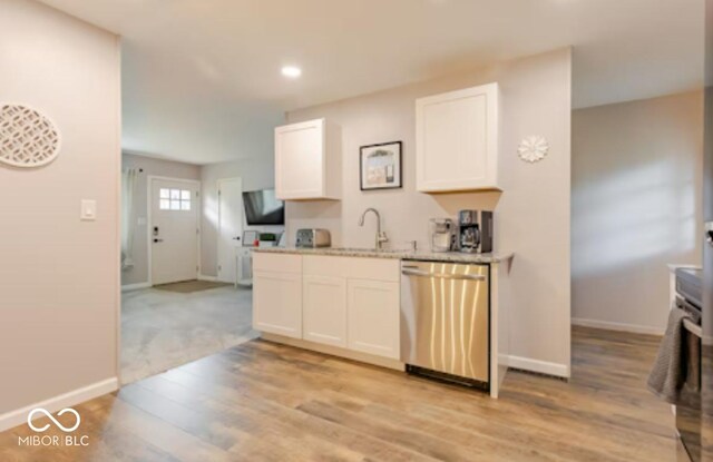 1398 Clinton St, Noblesville, IN 46060 - kitchen featuring dishwasher, a sink, baseboards, white cabinetry, and recessed lighting