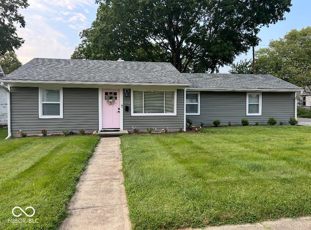 1398 Clinton St, Noblesville, IN 46060 - view of front of house with a front lawn and roof with shingles