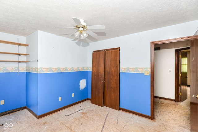 1113 Delray Dr, Indianapolis, IN 46241 - unfurnished room with a ceiling fan, a textured ceiling, and baseboards