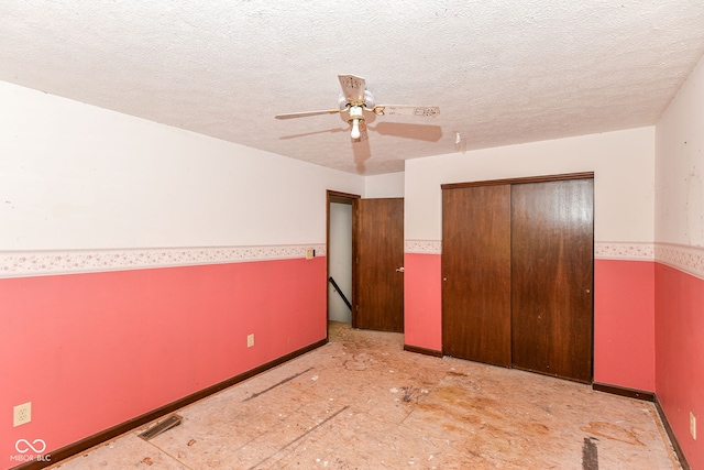 1113 Delray Dr, Indianapolis, IN 46241 - unfurnished bedroom with a closet, a textured ceiling, and a ceiling fan