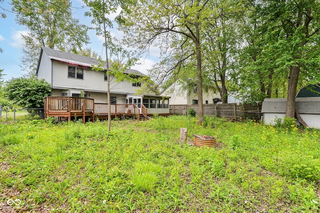 1113 Delray Dr, Indianapolis, IN 46241 - view of yard featuring a sunroom and a deck