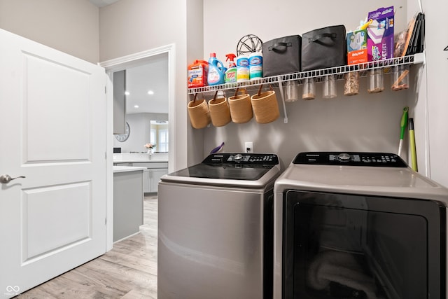 13321 N White Cloud Ct, Camby, IN 46113 - washroom featuring washer and dryer and light wood-type flooring