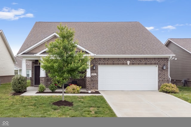 13321 N White Cloud Ct, Camby, IN 46113 - view of front of home featuring brick siding, a garage, concrete driveway, and a front lawn