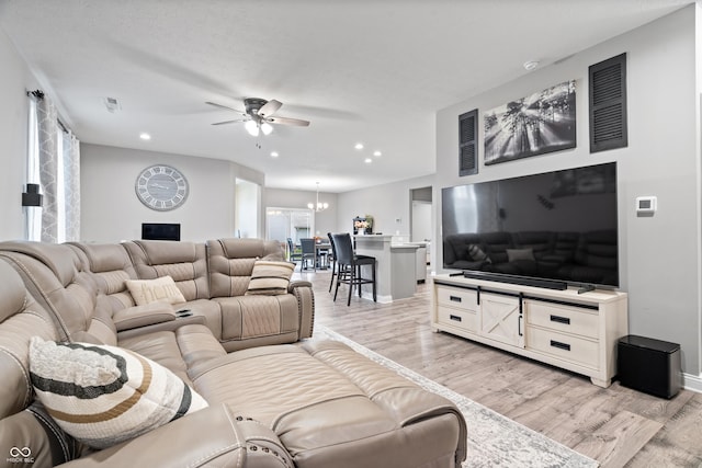 13321 N White Cloud Ct, Camby, IN 46113 - living area with ceiling fan, recessed lighting, light wood finished floors, a chandelier, and baseboards