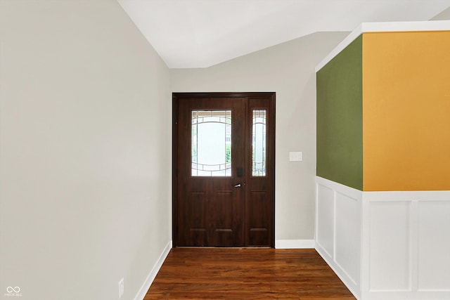 126 E 86th St, Indianapolis, IN 46240 - entrance foyer featuring lofted ceiling, dark wood-type flooring, and wainscoting