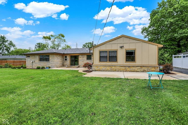 126 E 86th St, Indianapolis, IN 46240 - view of front of home featuring stone siding, board and batten siding, and a patio