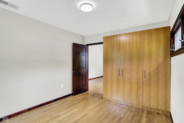 126 E 86th St, Indianapolis, IN 46240 - unfurnished bedroom featuring light wood-style floors and baseboards