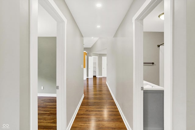 126 E 86th St, Indianapolis, IN 46240 - hallway featuring dark wood-type flooring, baseboards, and recessed lighting
