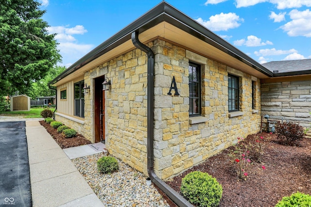 126 E 86th St, Indianapolis, IN 46240 - view of property exterior featuring stone siding