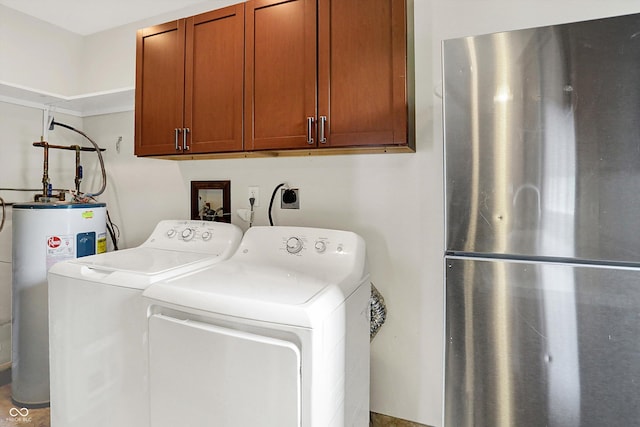 126 E 86th St, Indianapolis, IN 46240 - washroom featuring water heater, cabinet space, and washing machine and clothes dryer