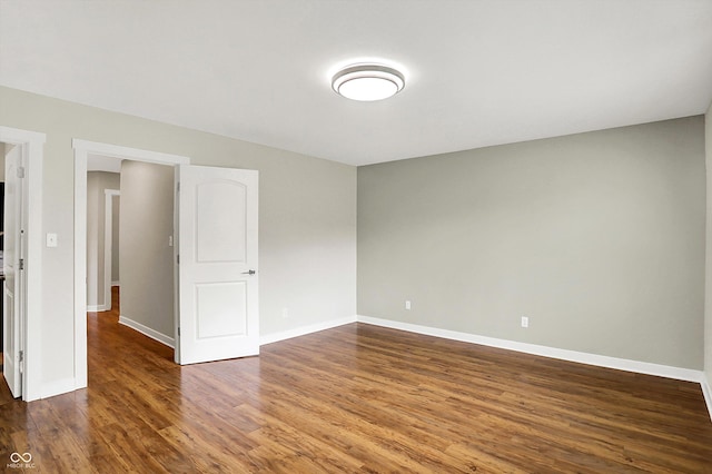 126 E 86th St, Indianapolis, IN 46240 - empty room with wood finished floors and baseboards
