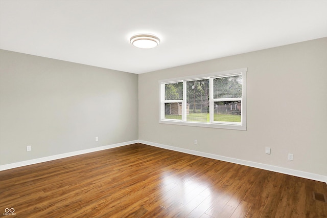 126 E 86th St, Indianapolis, IN 46240 - empty room with wood finished floors and baseboards