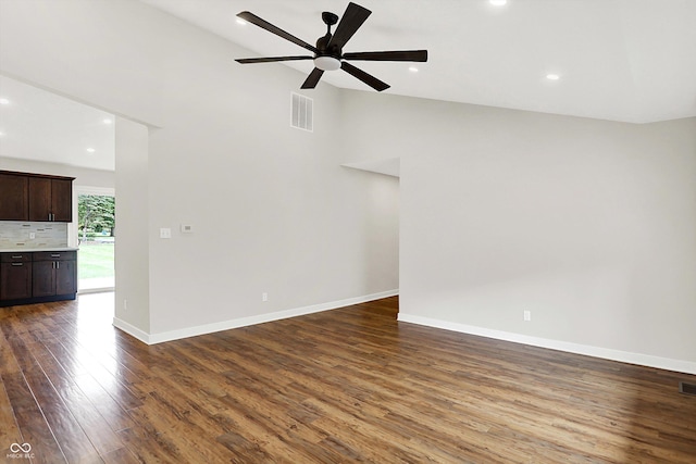 126 E 86th St, Indianapolis, IN 46240 - unfurnished living room featuring a ceiling fan, wood finished floors, recessed lighting, baseboards, and high vaulted ceiling