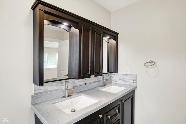 126 E 86th St, Indianapolis, IN 46240 - full bathroom featuring double vanity and decorative backsplash